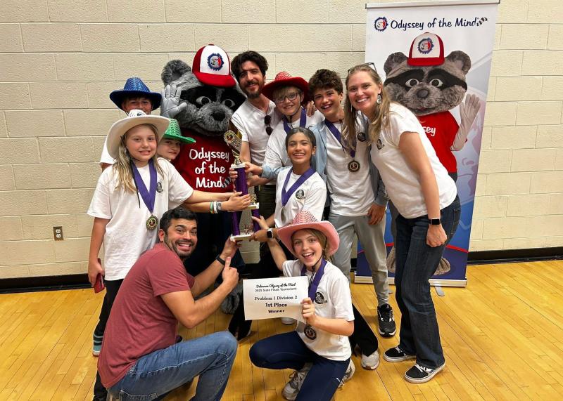 Mariner Middle School OM Problem 1 team members shown with the OM mascot are in back (l-r) Liam Carter, Hunter Willis, Lane Carter, Noa Urrestarazu and Erin Willis. In the middle are Claire Brown, Robert Lehne and Mia Delgado Rodriguez. In front are Norel Delgado and Maybellene Willis. SUBMITTED PHOTOS